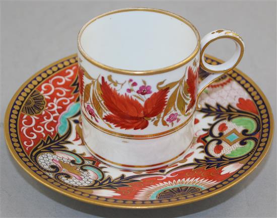 Five Worcester gilt and polychrome porcelain coffee cans and a saucer, c.1800-1820, coffee can 6.3cm, saucer 14.7cm